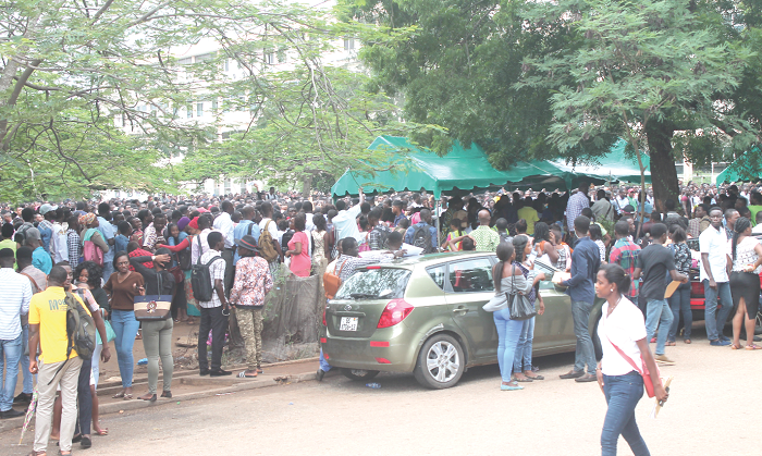 Some prospective national service personnel at  the Greater Accra Office of the National Service Scheme (NSS)  going through the registration process in Accra. Pictures: EDNA ADU-SERWAA